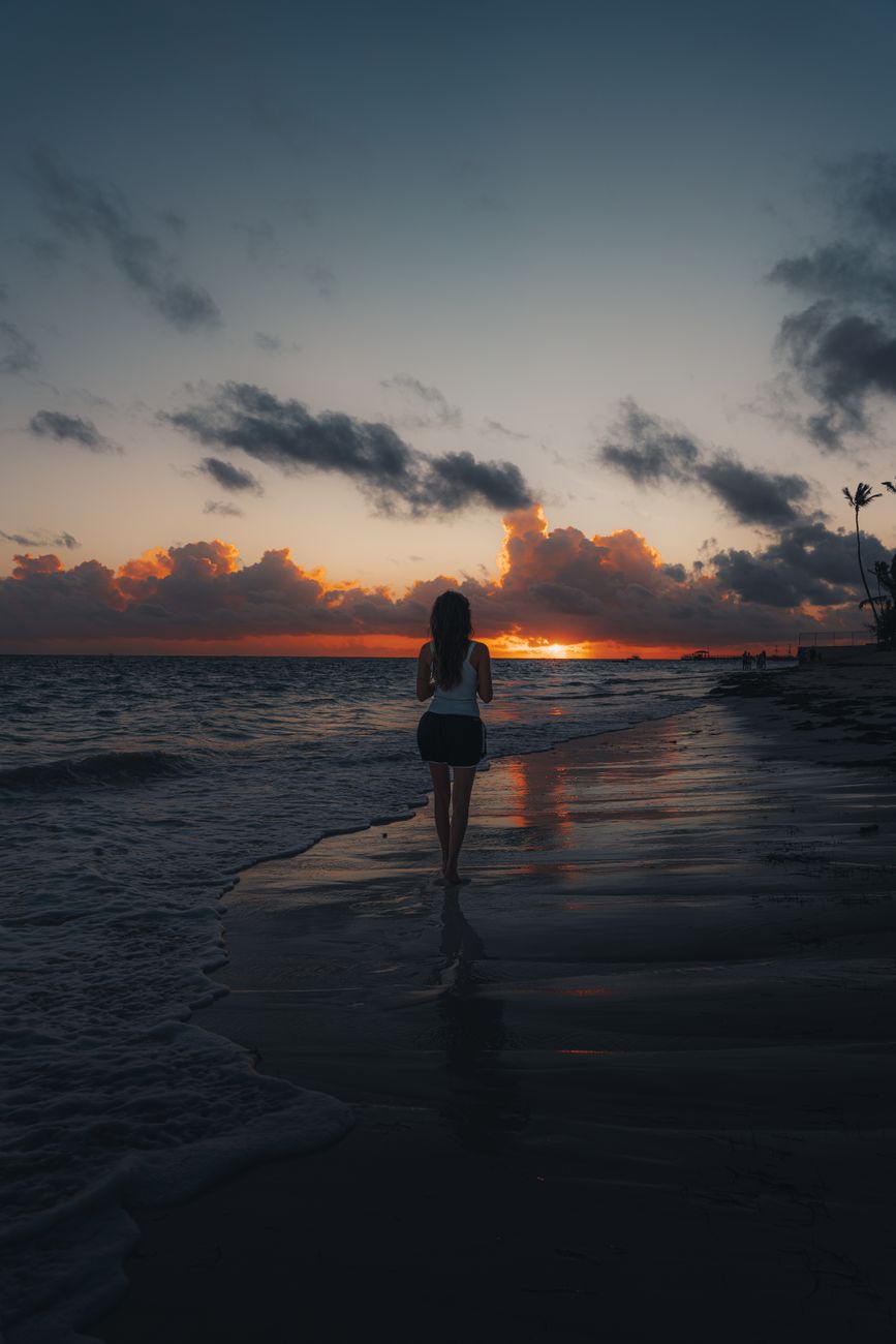Woman in a bikini by the water