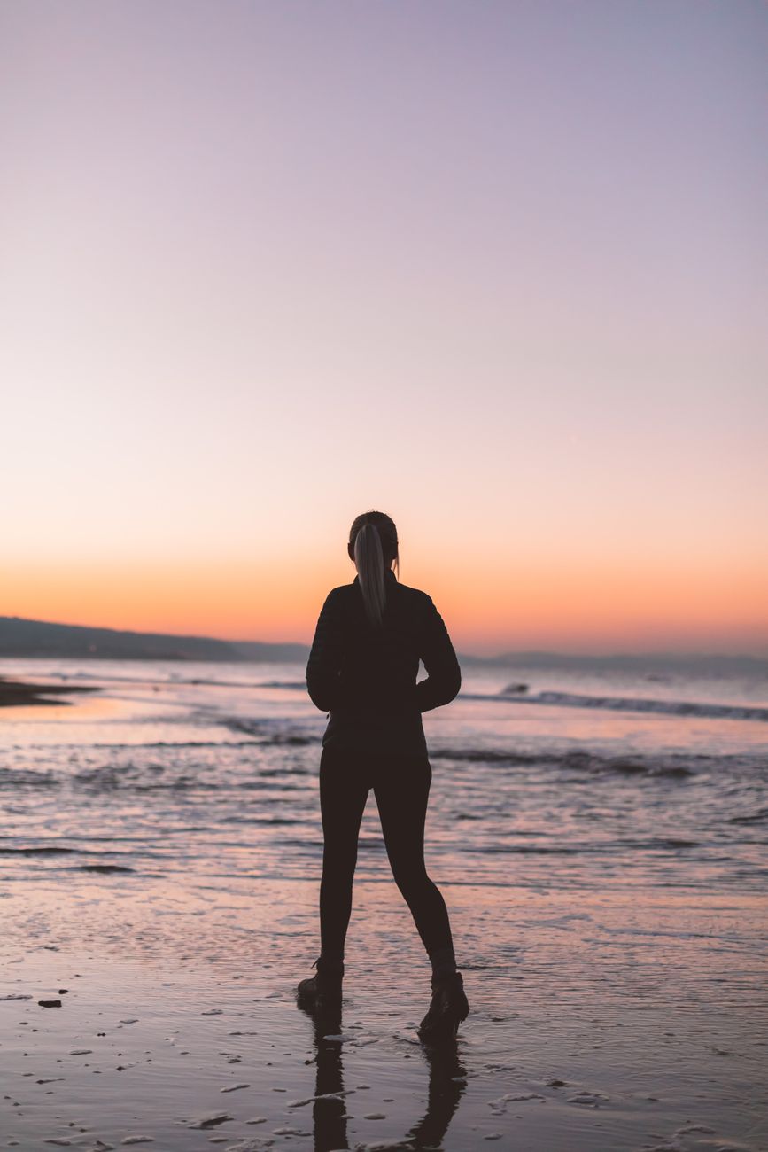 Woman in a bikini by the water